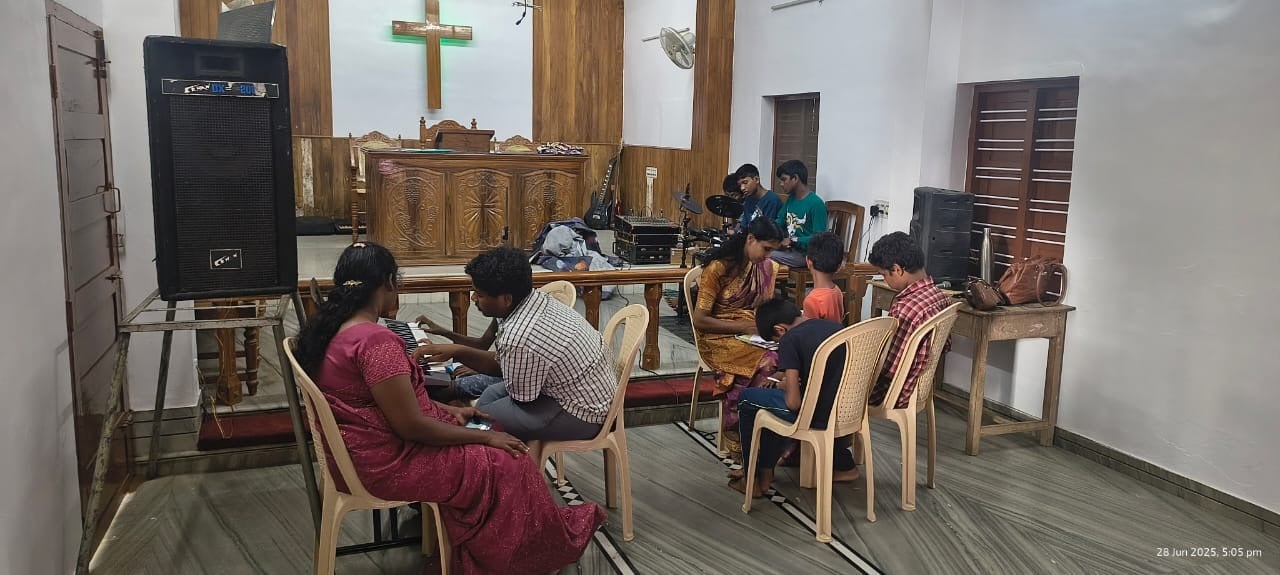 A music session with children and teachers in a church hall